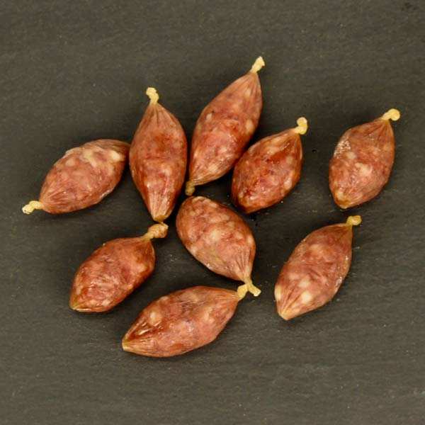 Petits saucissons secs apéritifs enrobés au parmesan