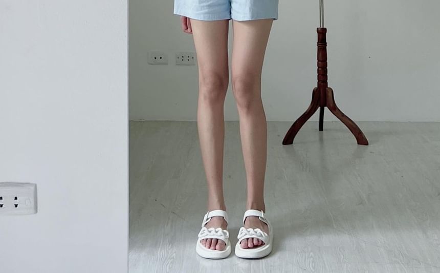 Coris - Mouwloze romper met knoopjes en effen kleur