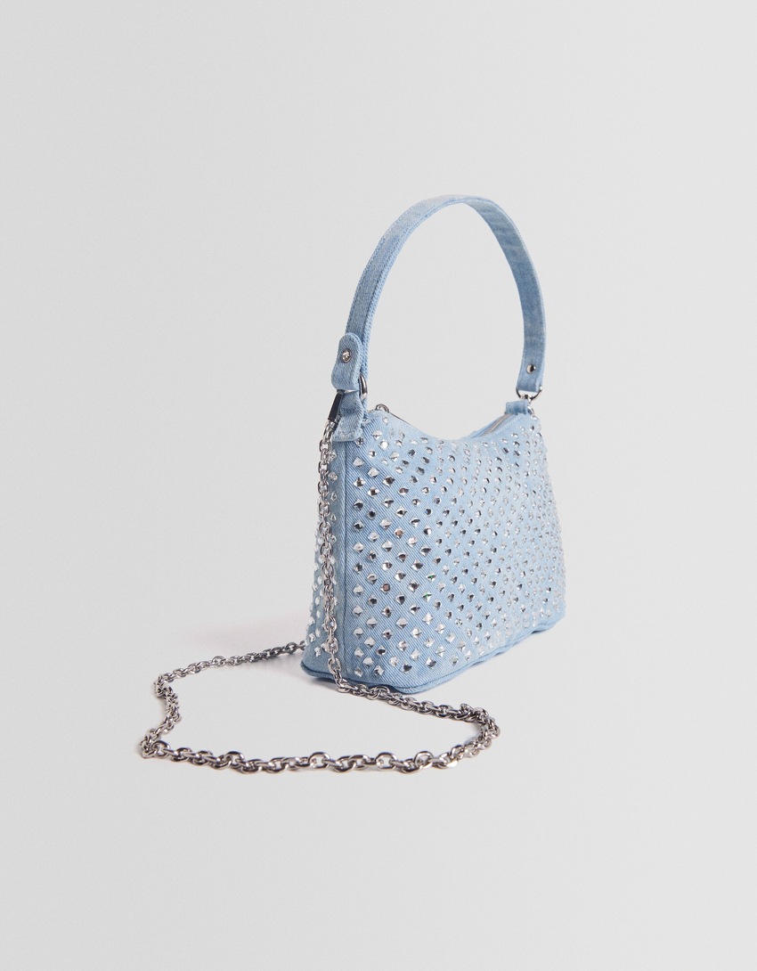 Bolsa transversal multifuncional em jeans com strass.