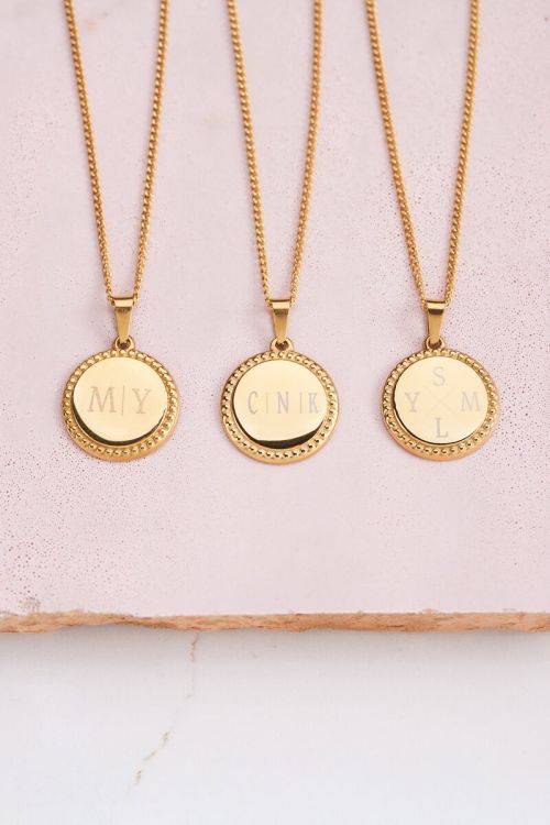Atelier lange ketting met ronde bedel