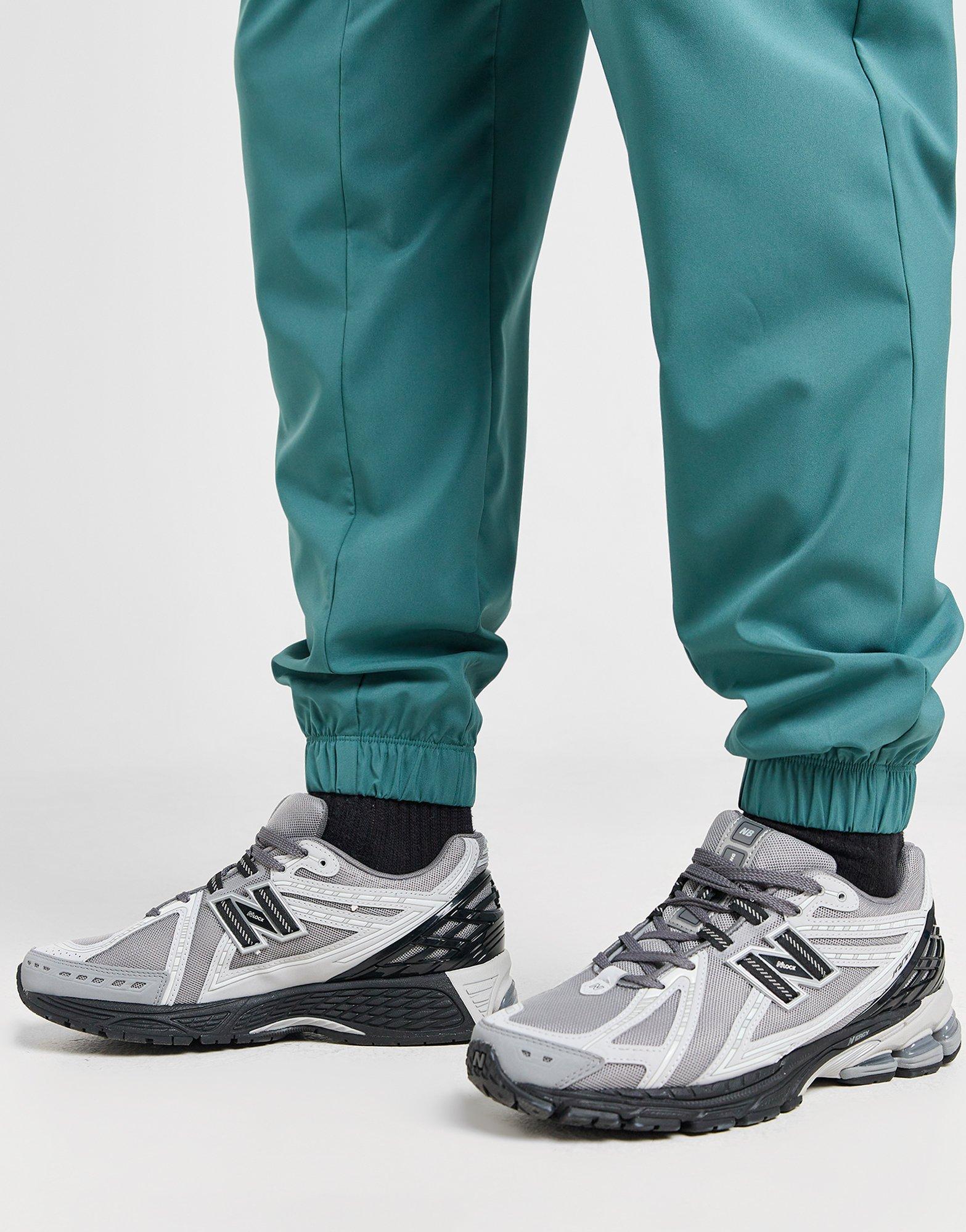 New Balance Pantalon de jogging Homme