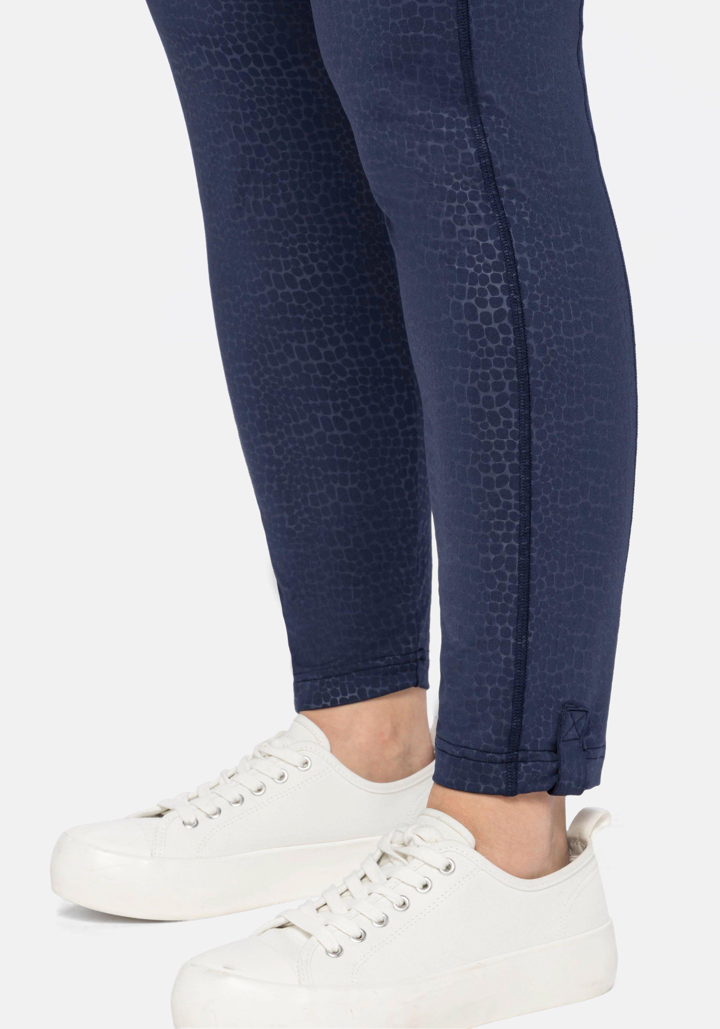Leggings mit Animalprint und Ziernähten