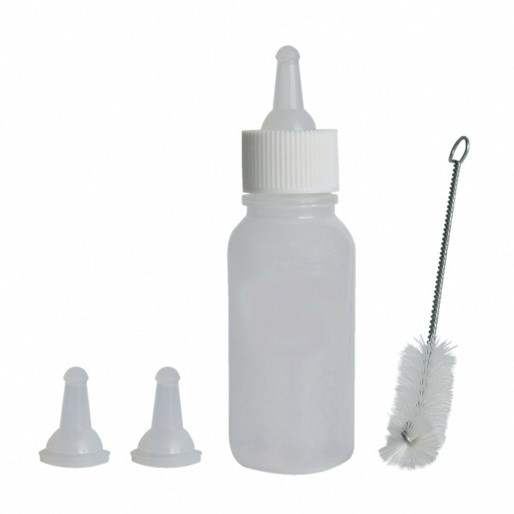 Un biberon 57 ml avec accessoire pour les bébés animaux