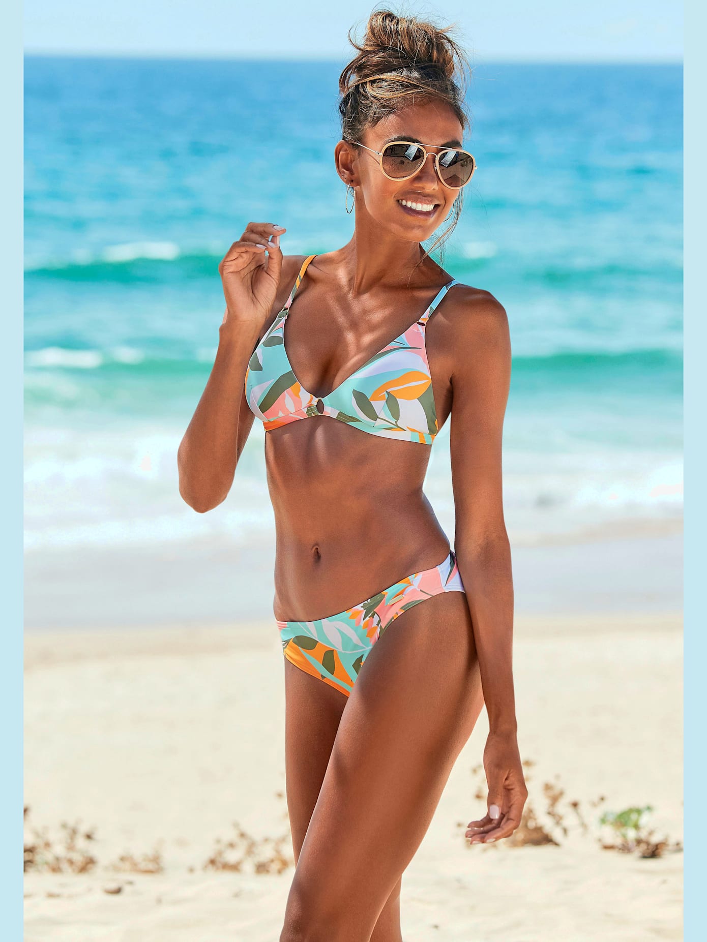 Bikini triangle imprimé feuilles abstrait