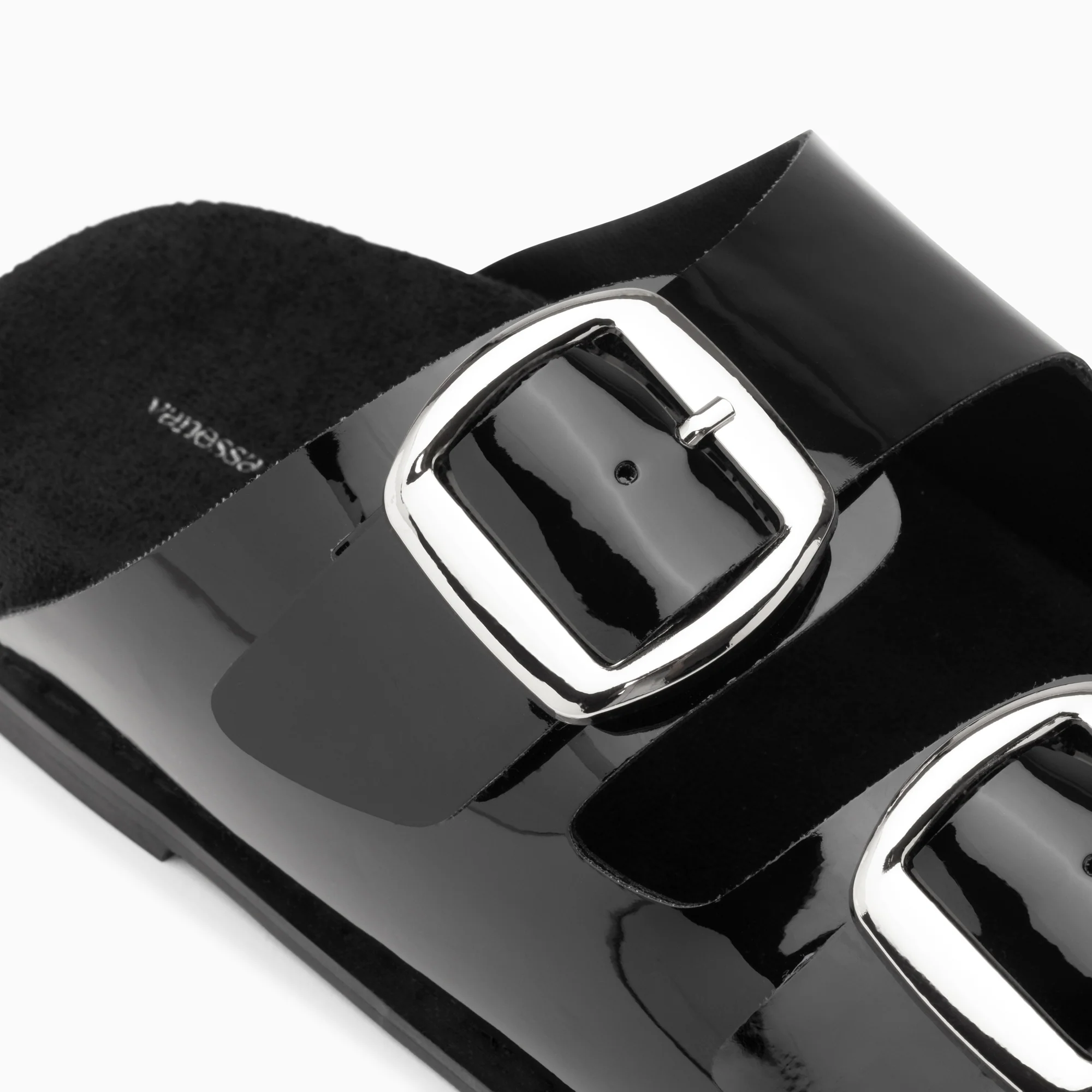 Sandales plates-Mules plates Célia noir verni à boucles oversize