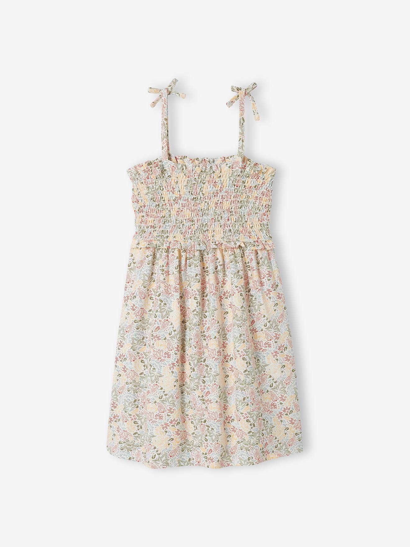 Vestido cor creme com detalhes franzidos, alças e motivos exóticos para meninas.