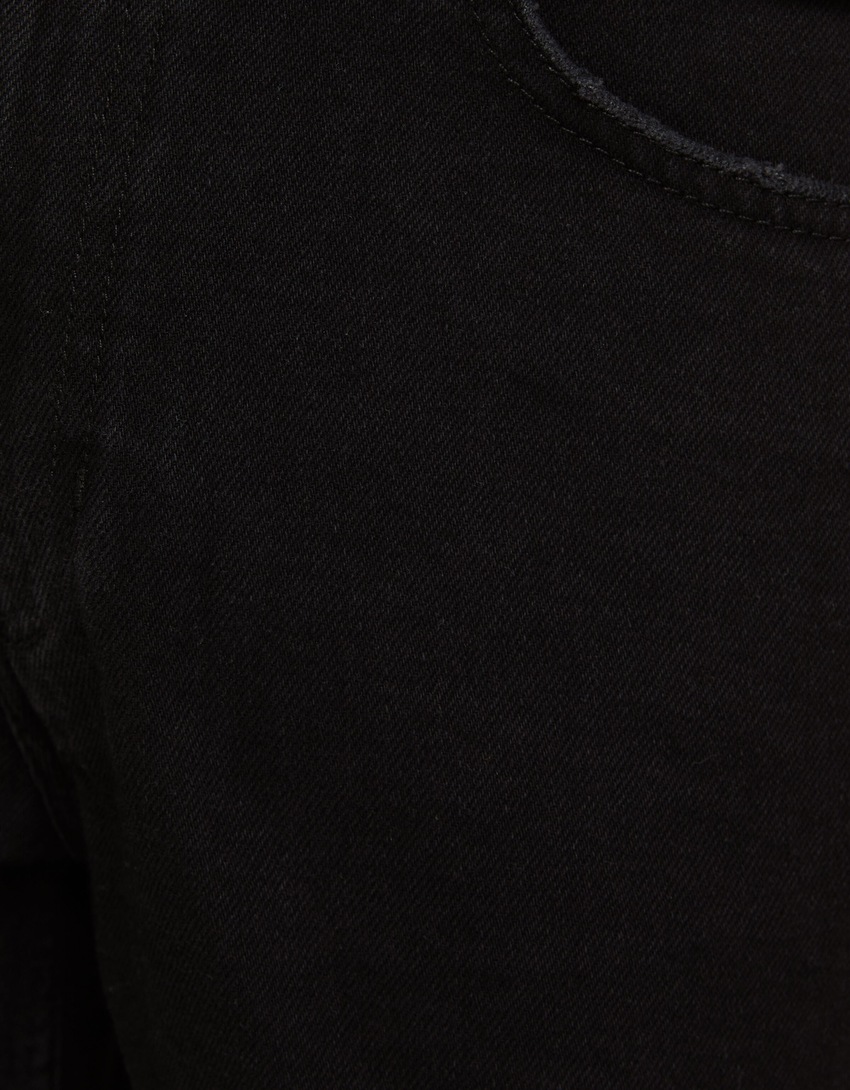Bermuda jeans rasgada de corte justo