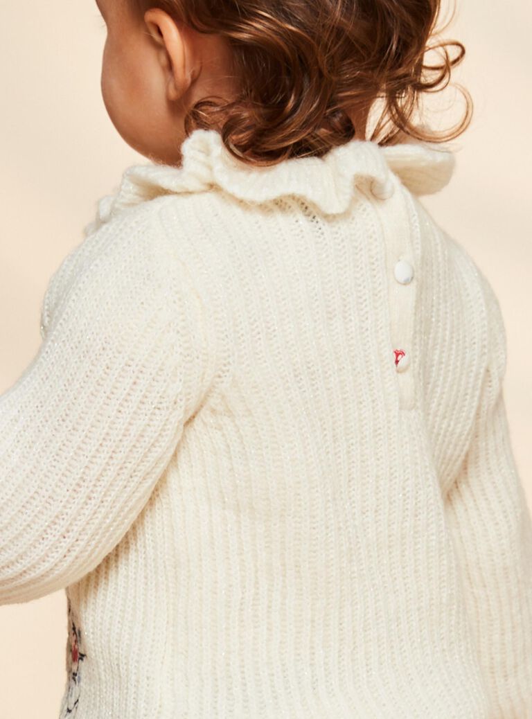 Pull écru en tricot avec tortues