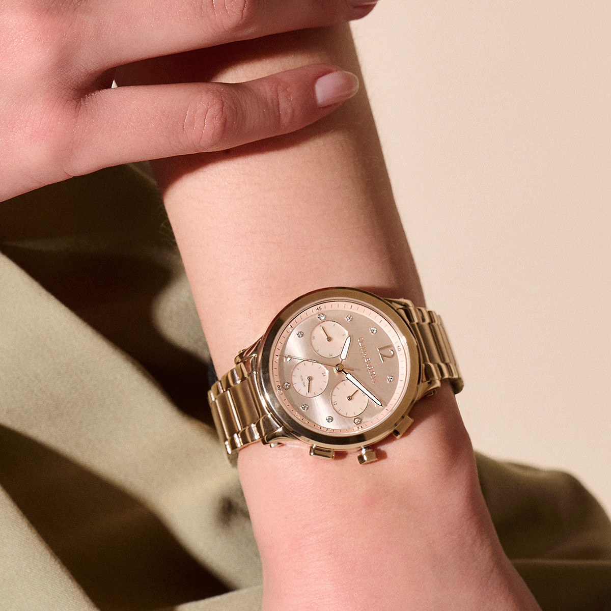 Montre OLIVIA BURTON multi function femme analogique, bracelet acier doré rose