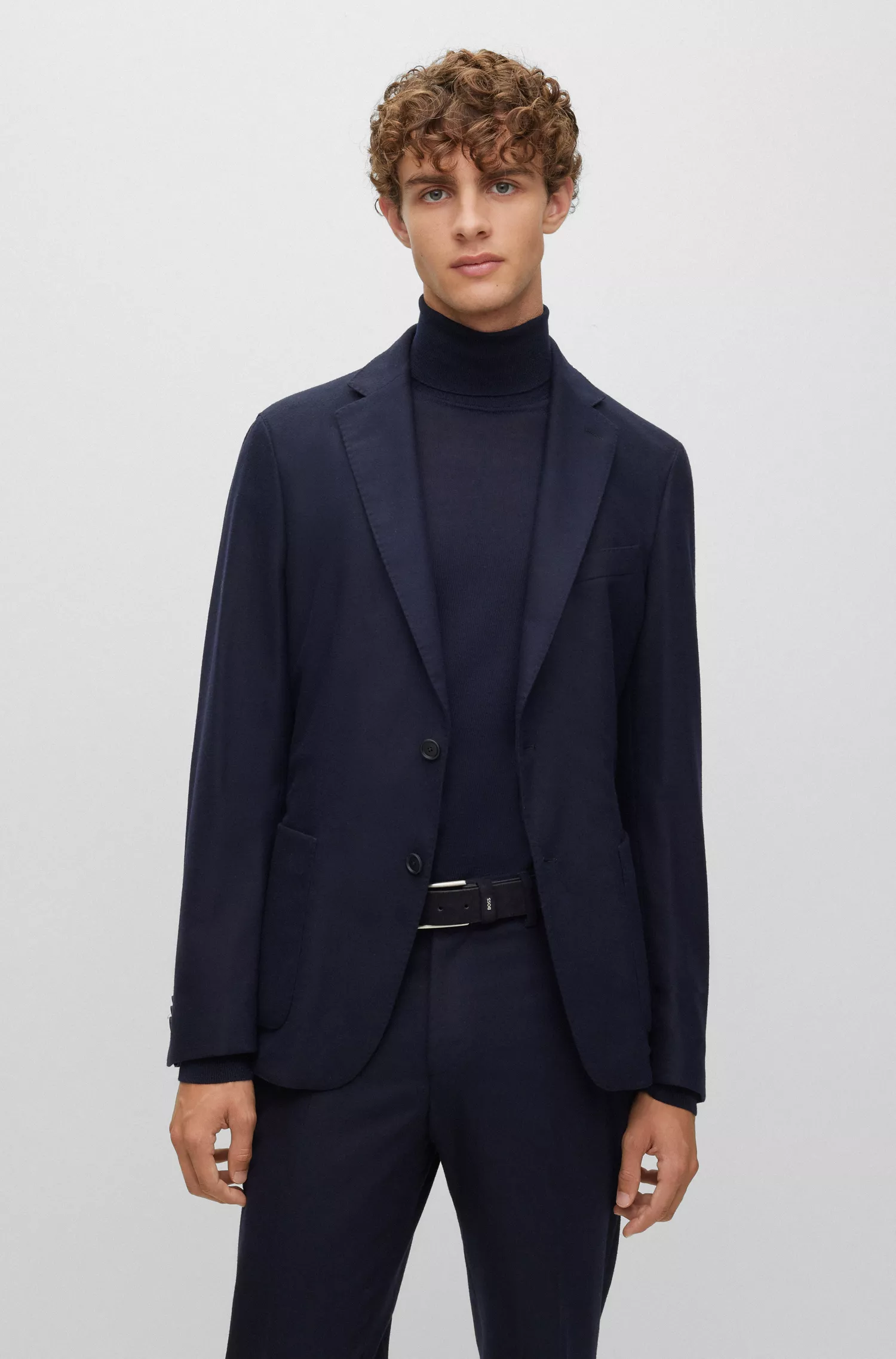 Blazer BOSS preto, corte slim, com um botão, em tecido elástico.