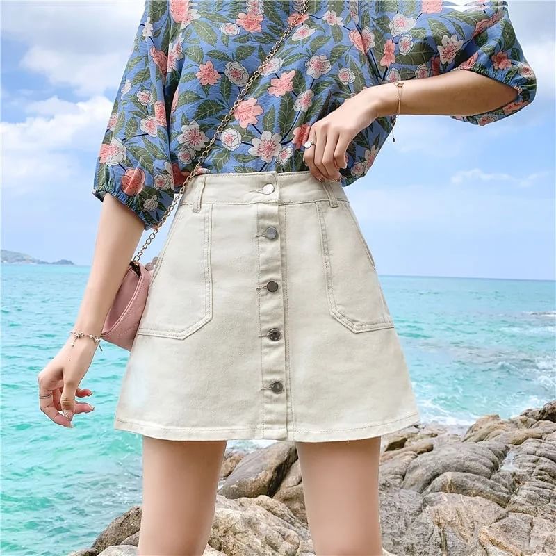 Coline - Hoge taille denim skort met knoopjes