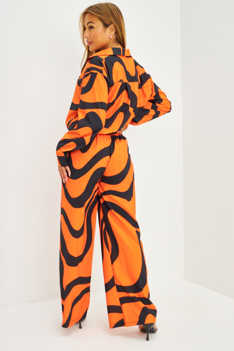 Ensemble fluide chemise + pantalon à lignes courbes orange