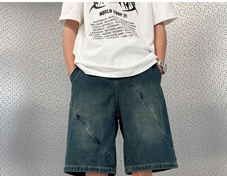 Nightbell - Mid-rise, gewassen denim shorts met panelen