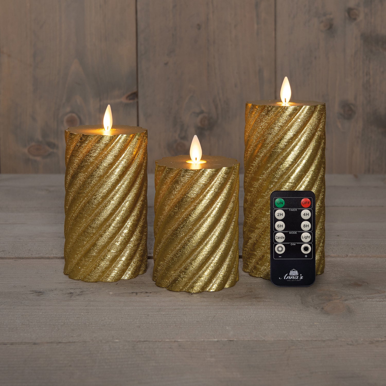 Anna's Collection LED stompkaars Swirl met timer goud D 7,5 H 10 / 12,5 / 15 cm 3 stuks