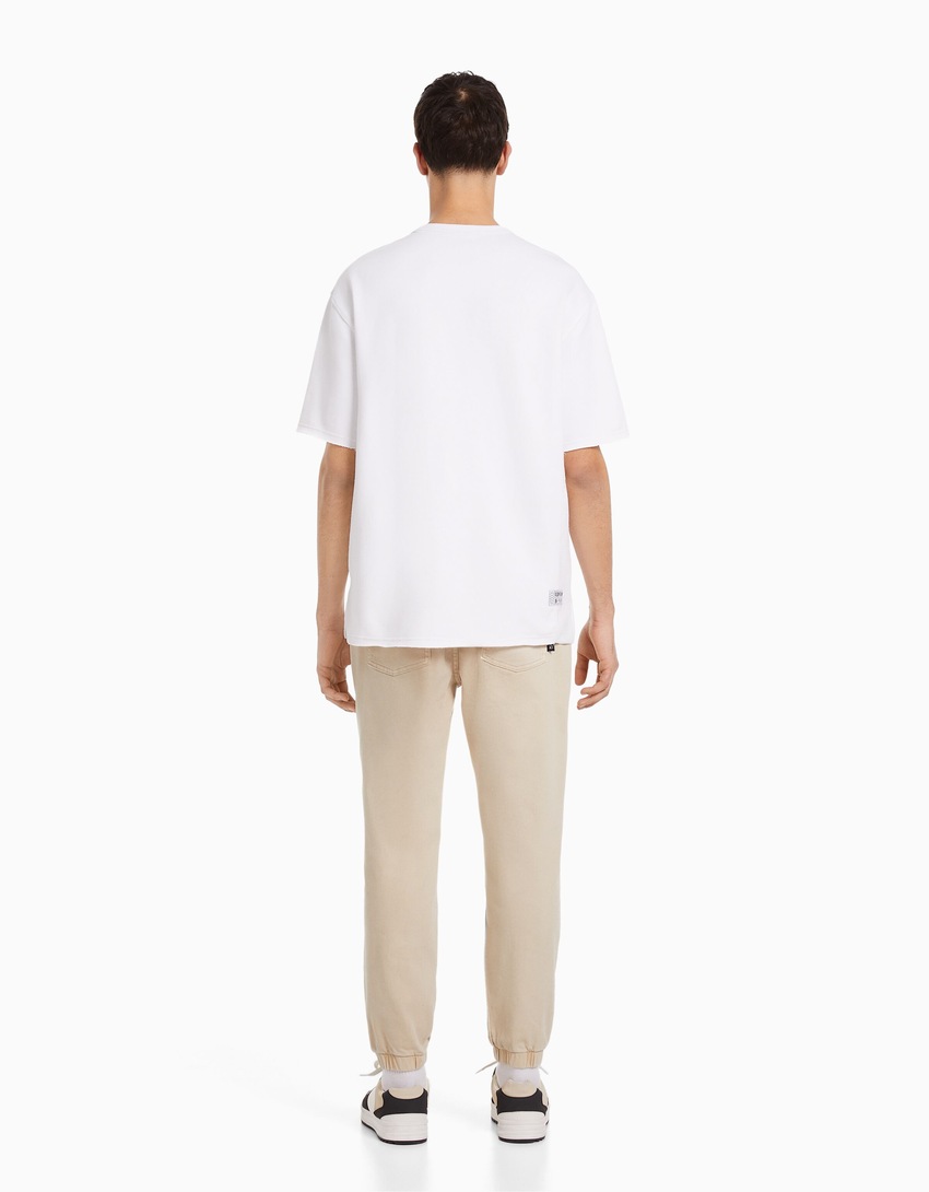 calça jogger rasgada