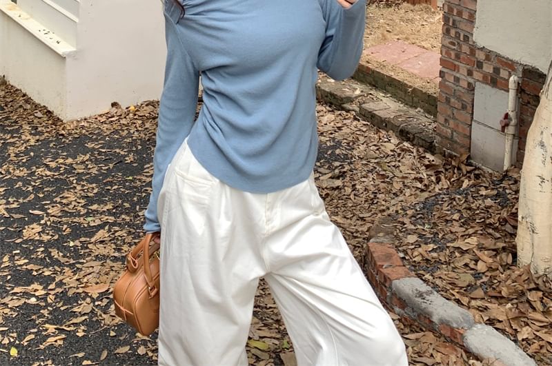Allinya - Lange mouwen off-shoulder gebreide top met knoop