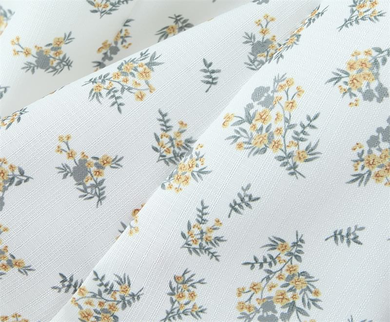 Avauntgardo - Halter V-hals bloemenprint kanten rand open rug mini A-lijn jurk