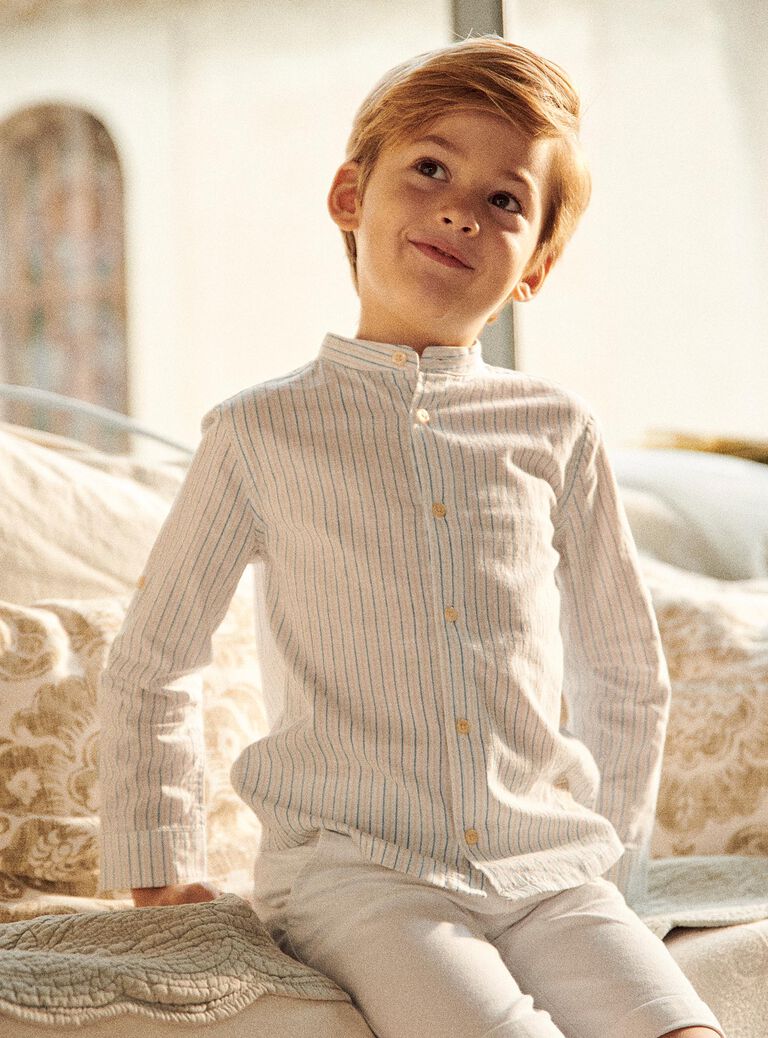 Chemise à rayures bleu, beige et blanc