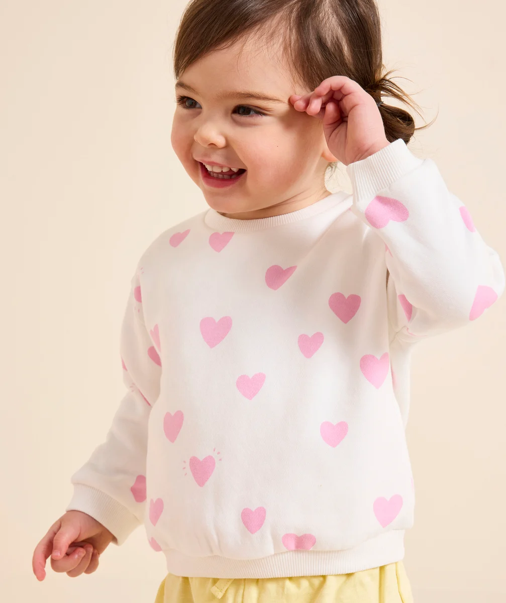 sweat manches longues bébé fille en fibres recyclées blanc imprimé coeurs