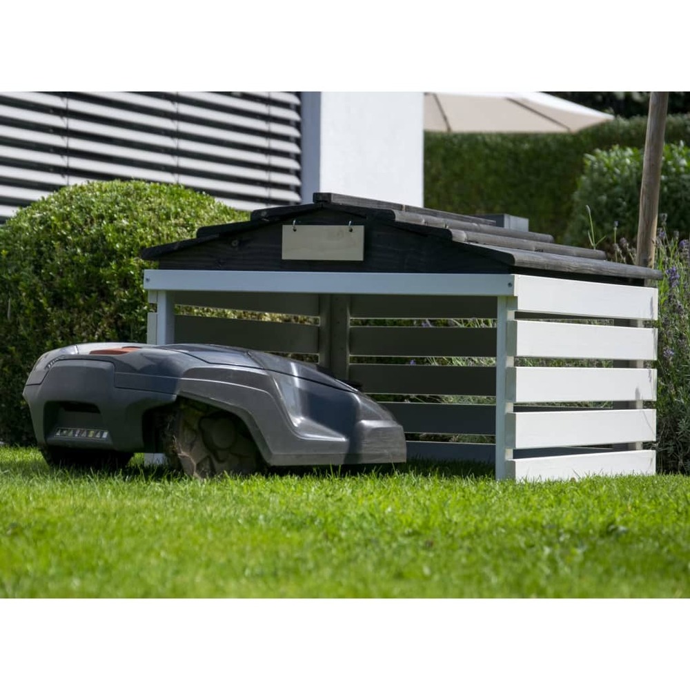 Garage de tondeuse à gazon noir et blanc