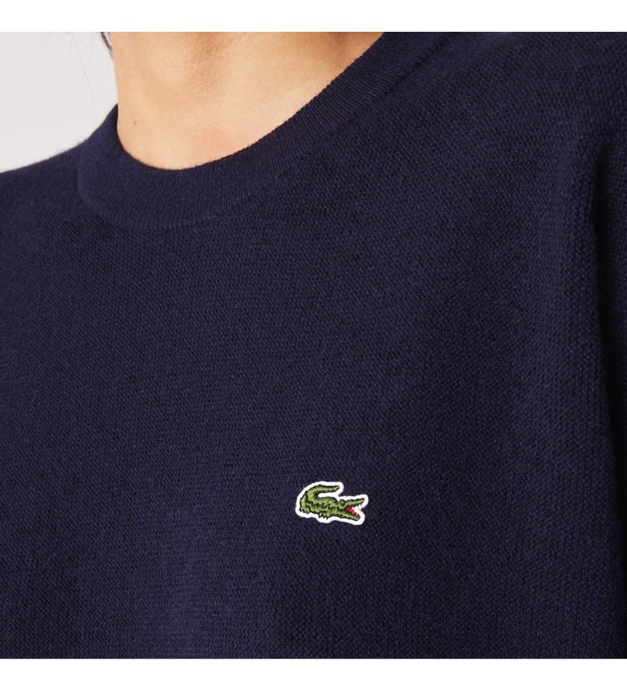 Camisa esportiva Lacoste em lã azul marinho escura.