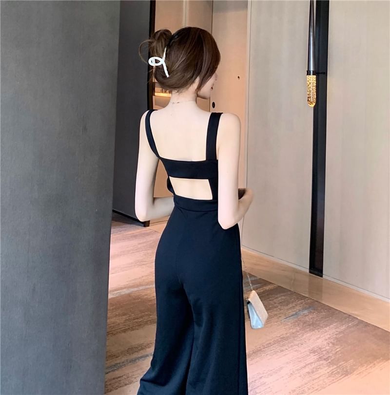 Magma - Mouwloze jumpsuit met open rug en wijde pijpen