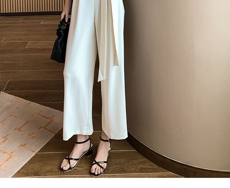 BOHEME - Halter-hals jumpsuit met strik aan de zijkant