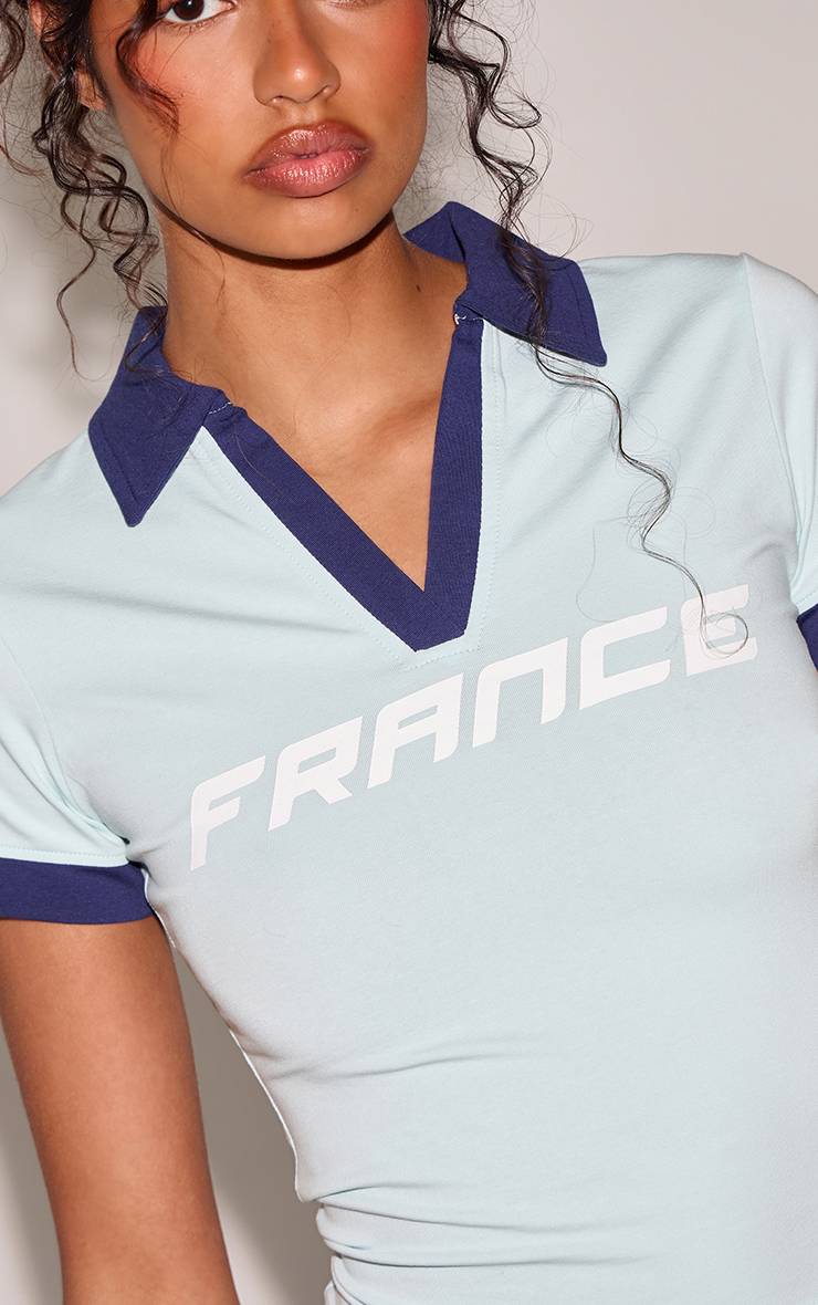 Bleu Clair Haut À Manches Courtes Avec Logo France Et Bordure Contrastante