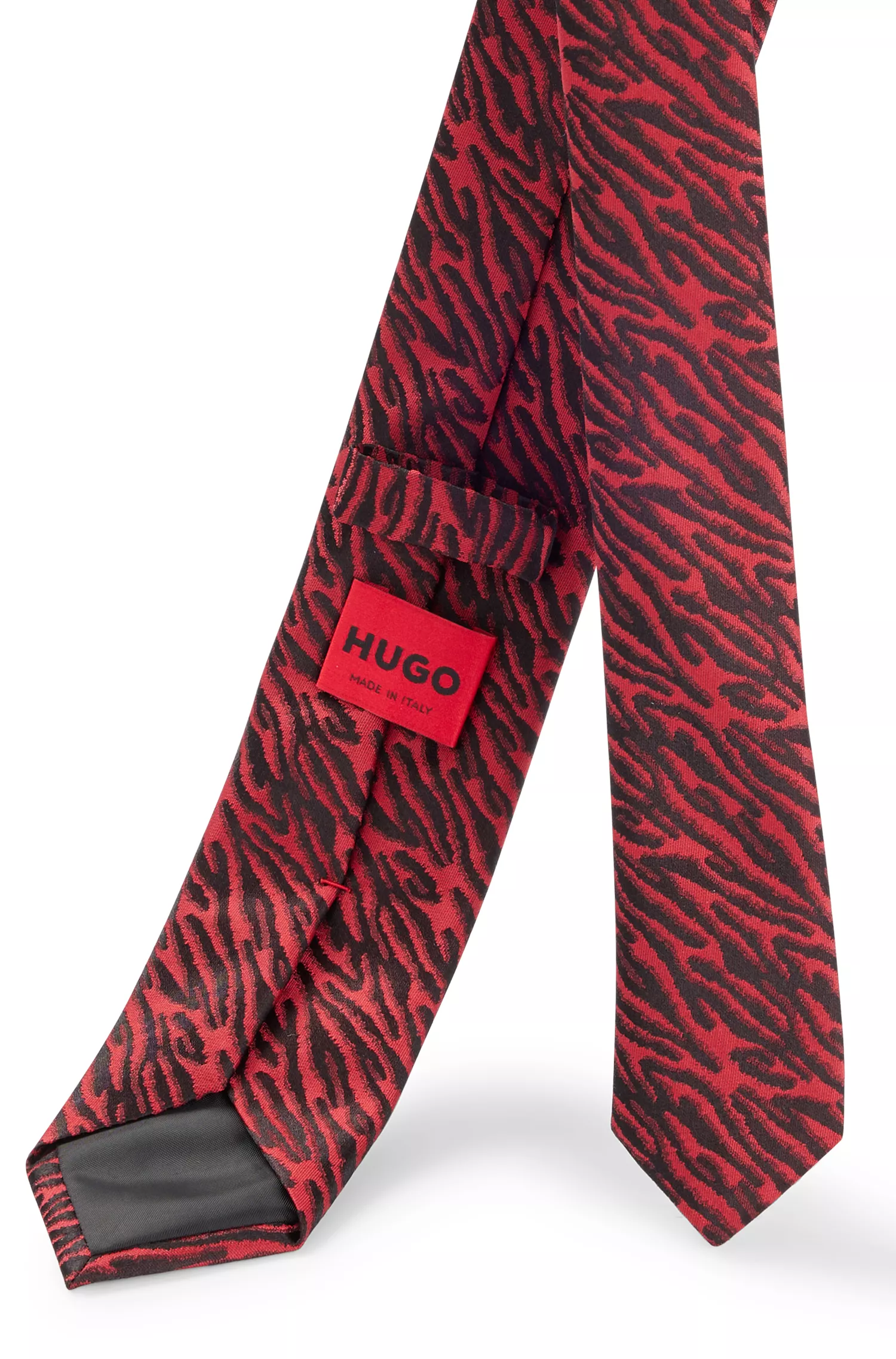 Gravata HUGO vermelha em jacquard com estampa animal e detalhes em seda.