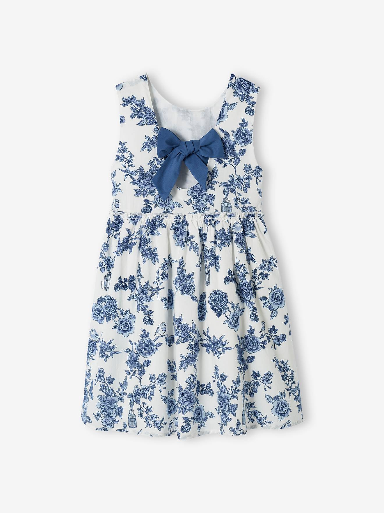 Vestido de festa infantil com flores e laço nas costas, na cor branco-creme.