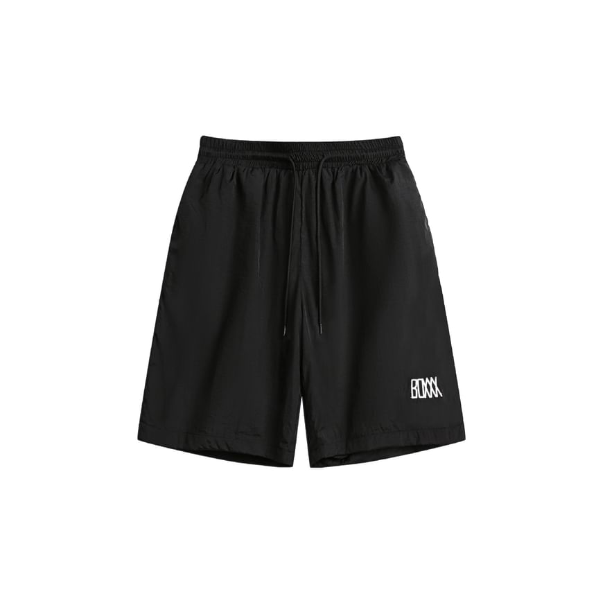 Hushgrain - Wijde shorts met hoge taille en letters