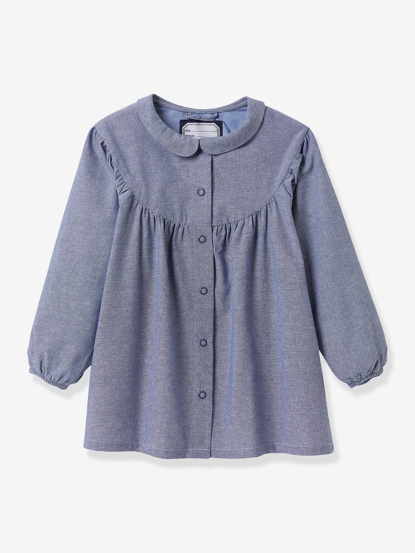 Vestido infantil Cyrillus com gola Peter Pan, em chambray azul.