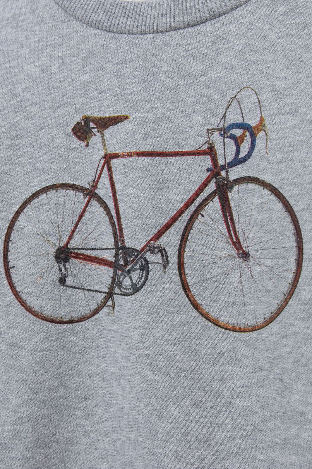 Grijze sweater met fiets