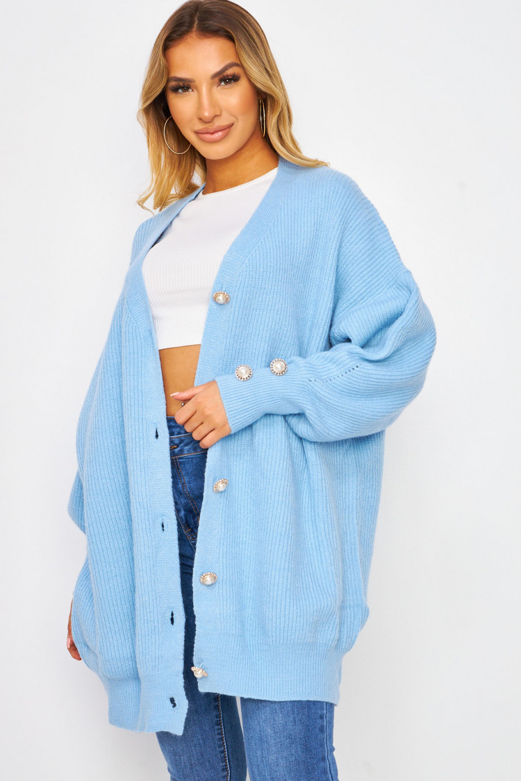 Gilet bleu avec boutons et manches ballons