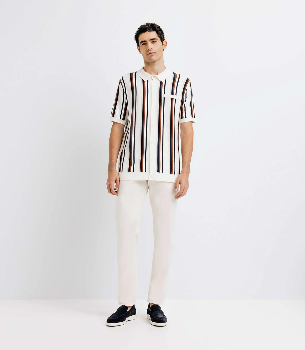 Polo en maille rayé écru