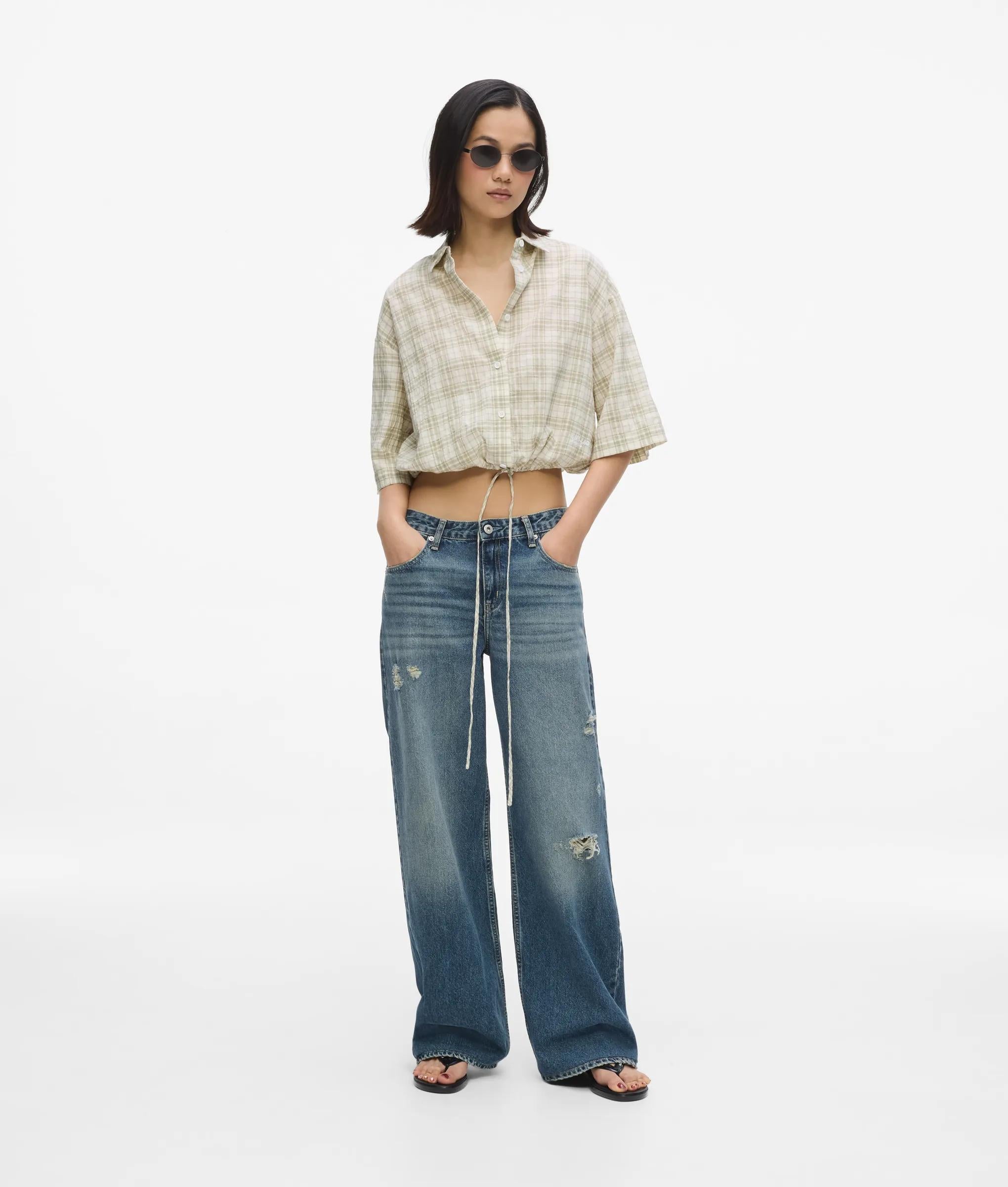 Relaxte jeans met halfhoge taille en verweerde details