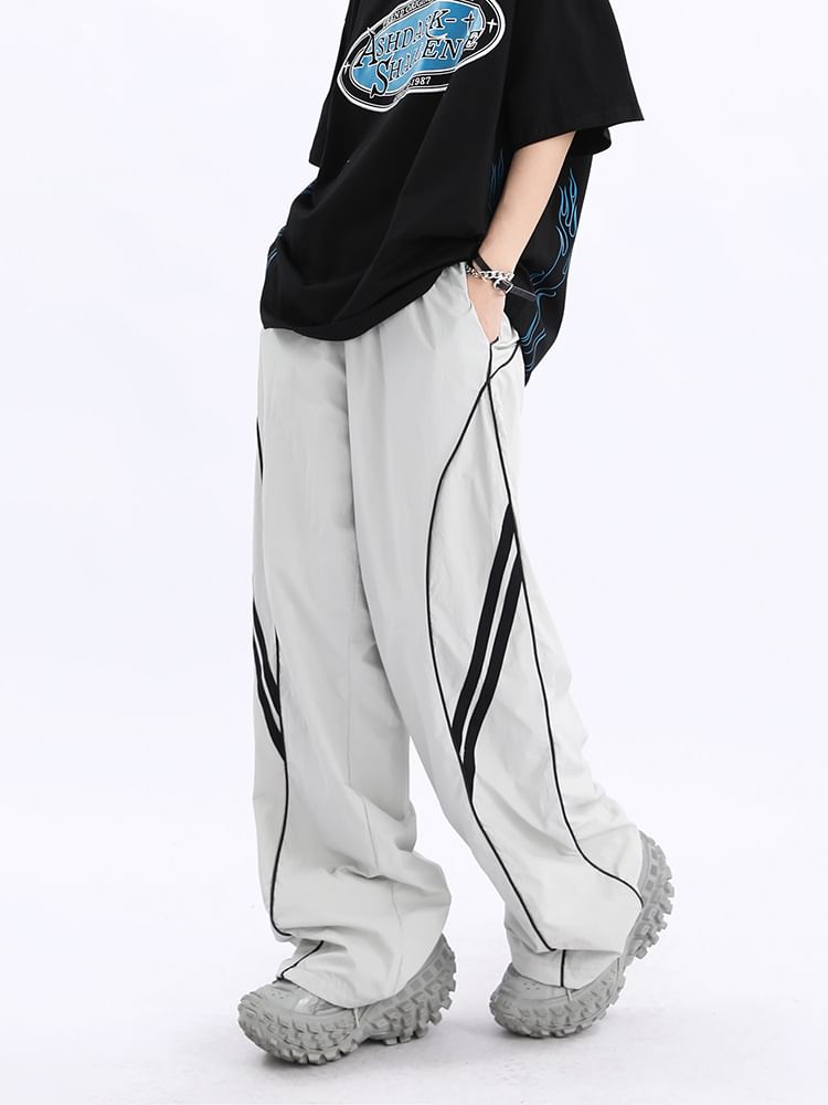 Rosesand - Lage taille gestreepte losse wijde joggingbroek