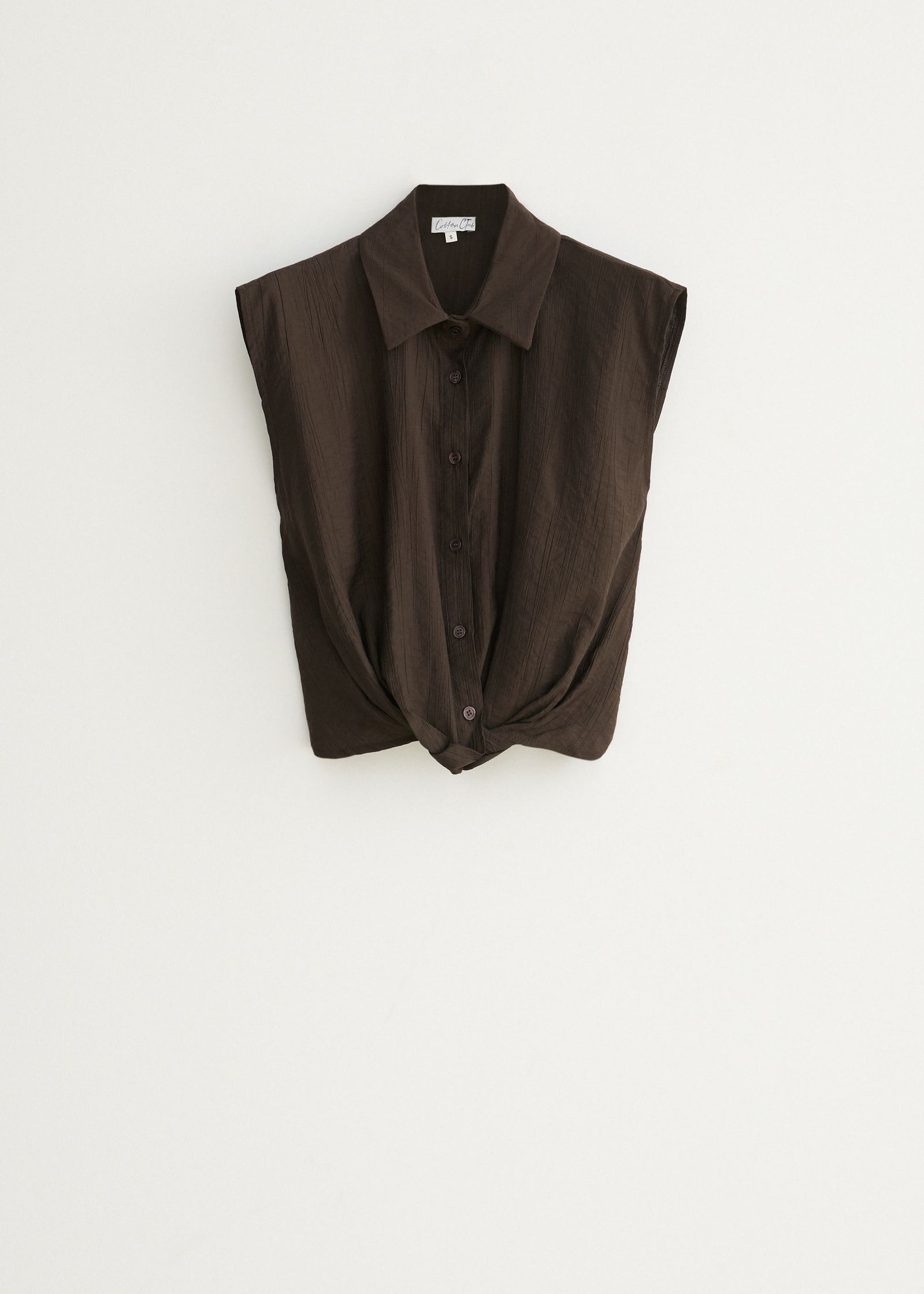 Mouwloze blouse met knoopdetail