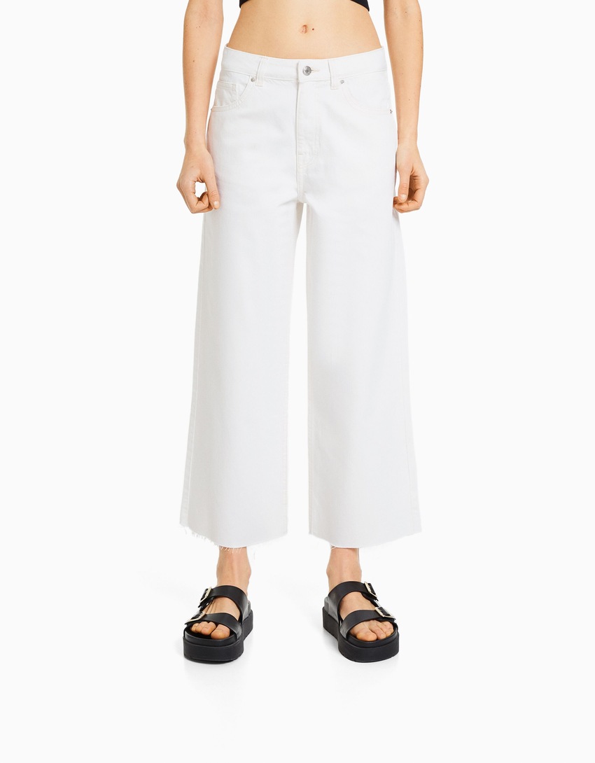 calças jeans cropped de perna larga