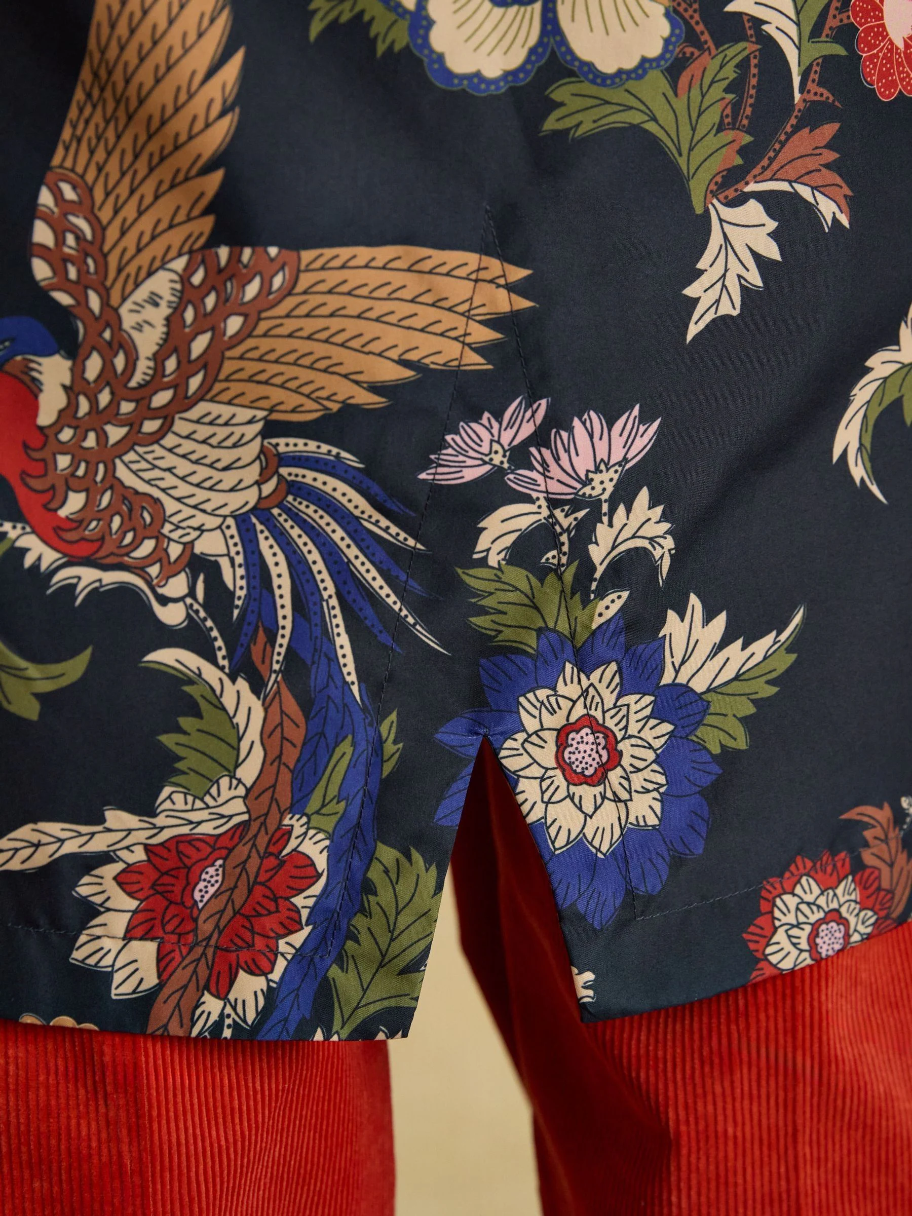 Marineblauw met vogel en bloemenprint - Joules Holkham waterdichte opvouwbare regenjas met capuchon