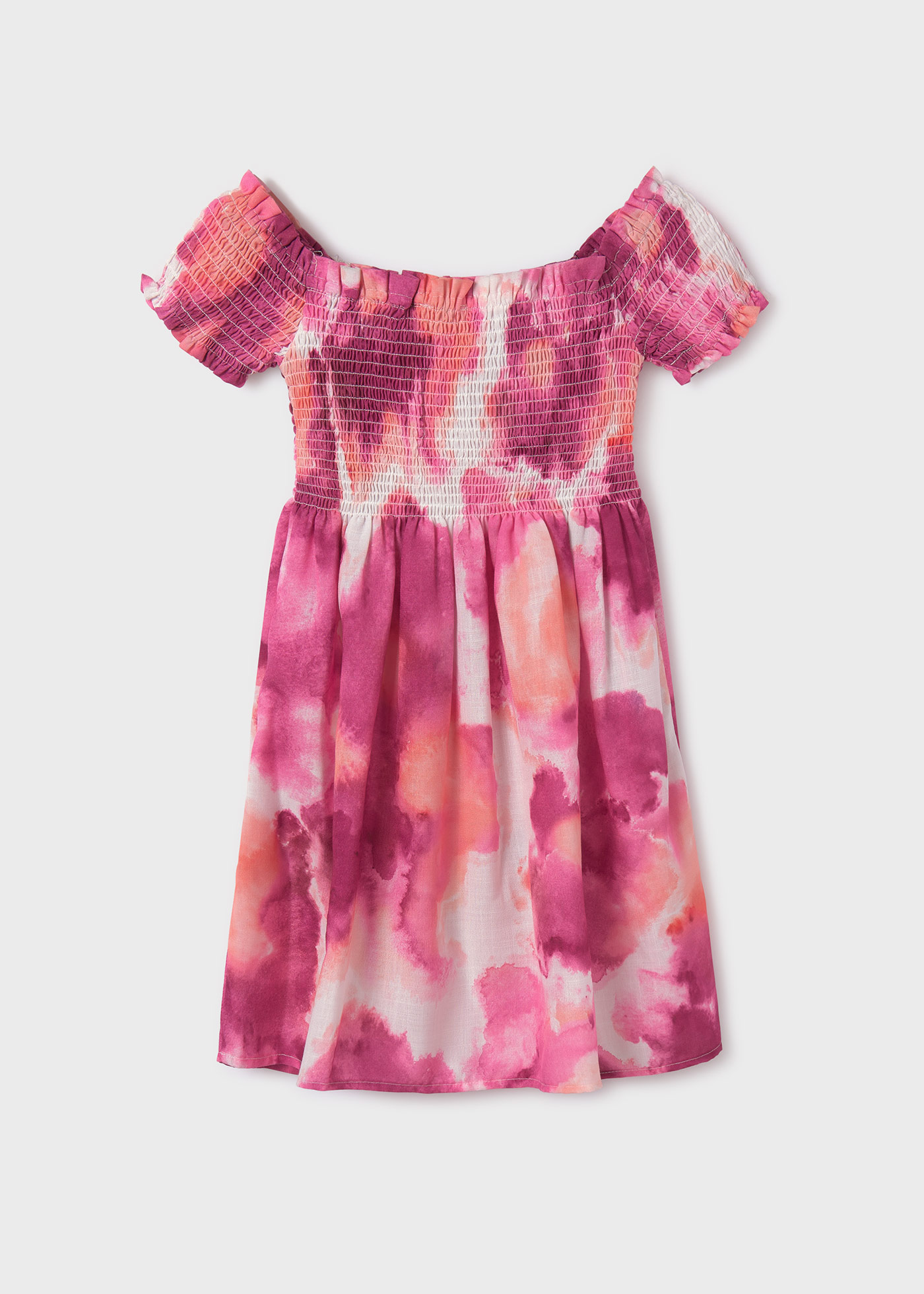 Vestido infantil com estampa de bolinhas e detalhes franzidos.