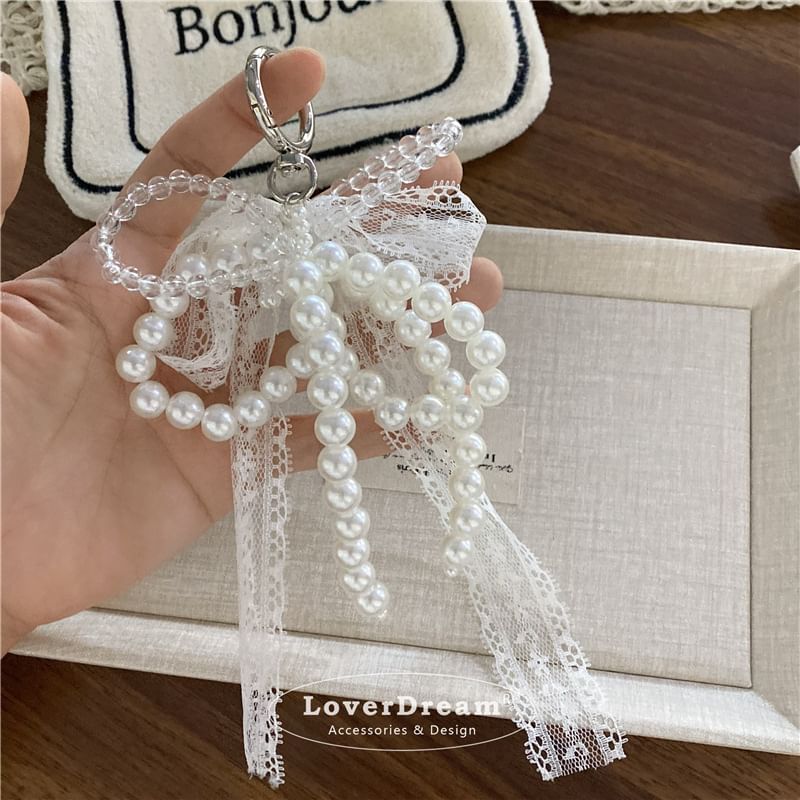 BeDaisy - Sleutelhanger met strik en imitatieparelkant