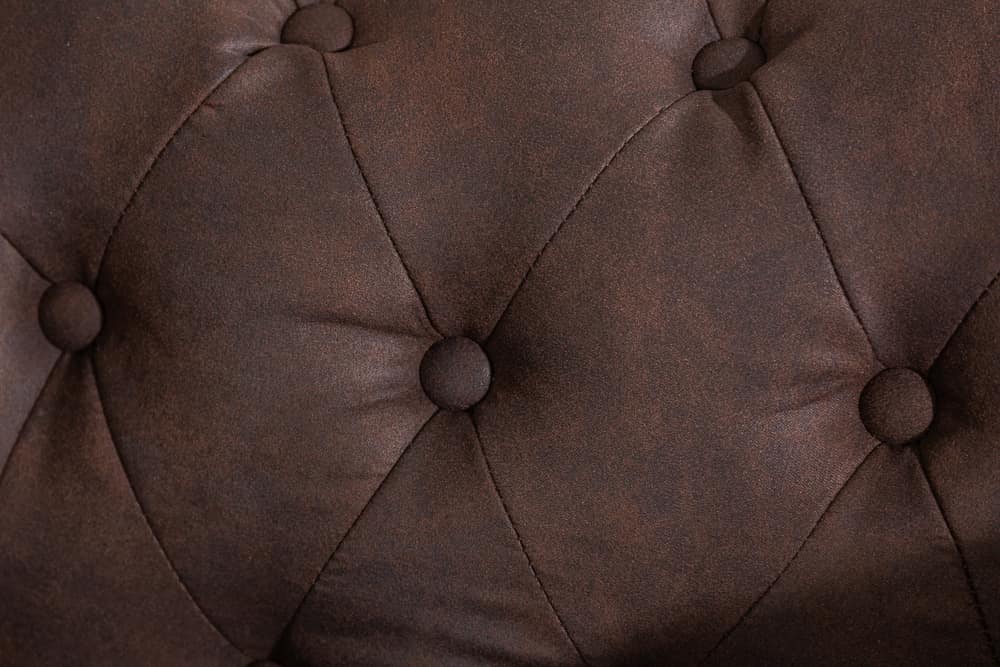 Chesterfield Sessel 110cm vintage braun mit Knopfheftung und Federkern