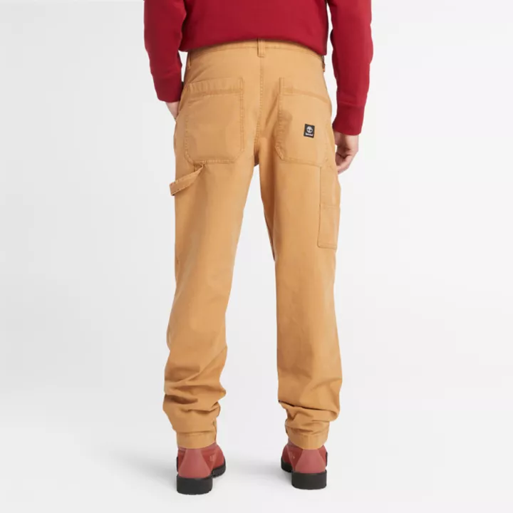 Pantalon charpentier stretch en toile lavée pour homme en jaune