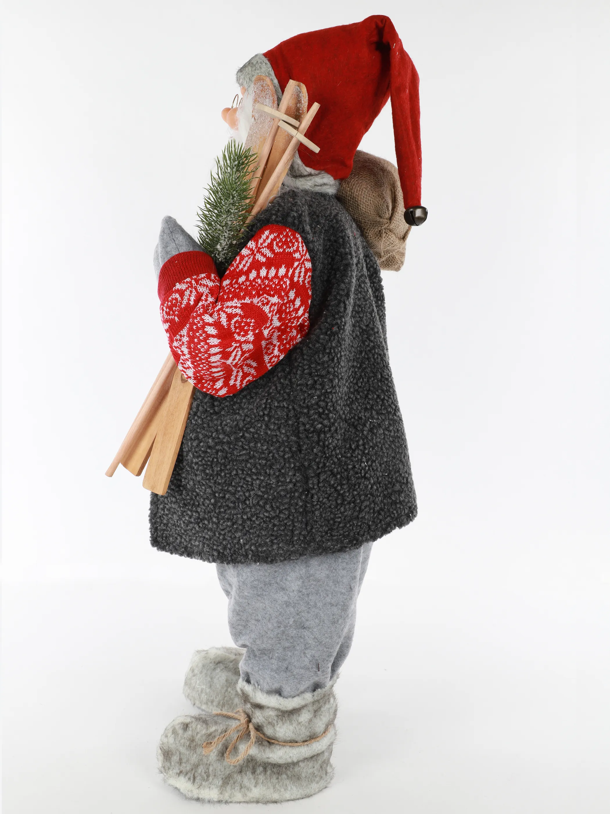 Weihnachtsmann stehendmit Skieern und Päckchen 60cm