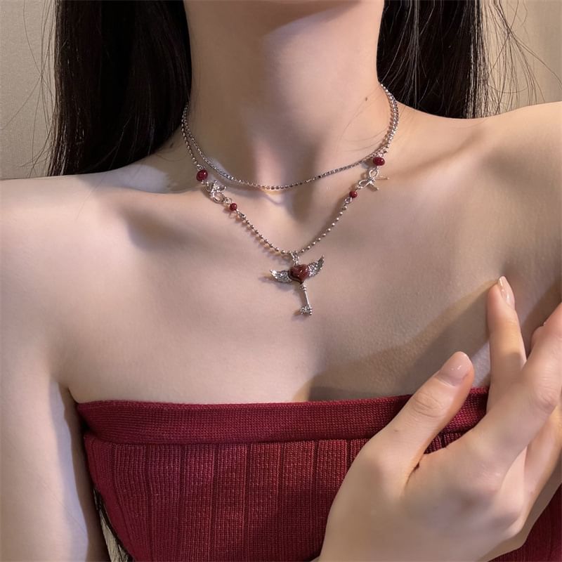 YANYUS - Wing Heart Key gelaagde ketting / oorbel