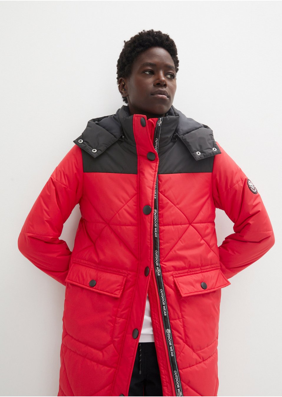 Manteau outdoor imperméable avec boutons sur le côté