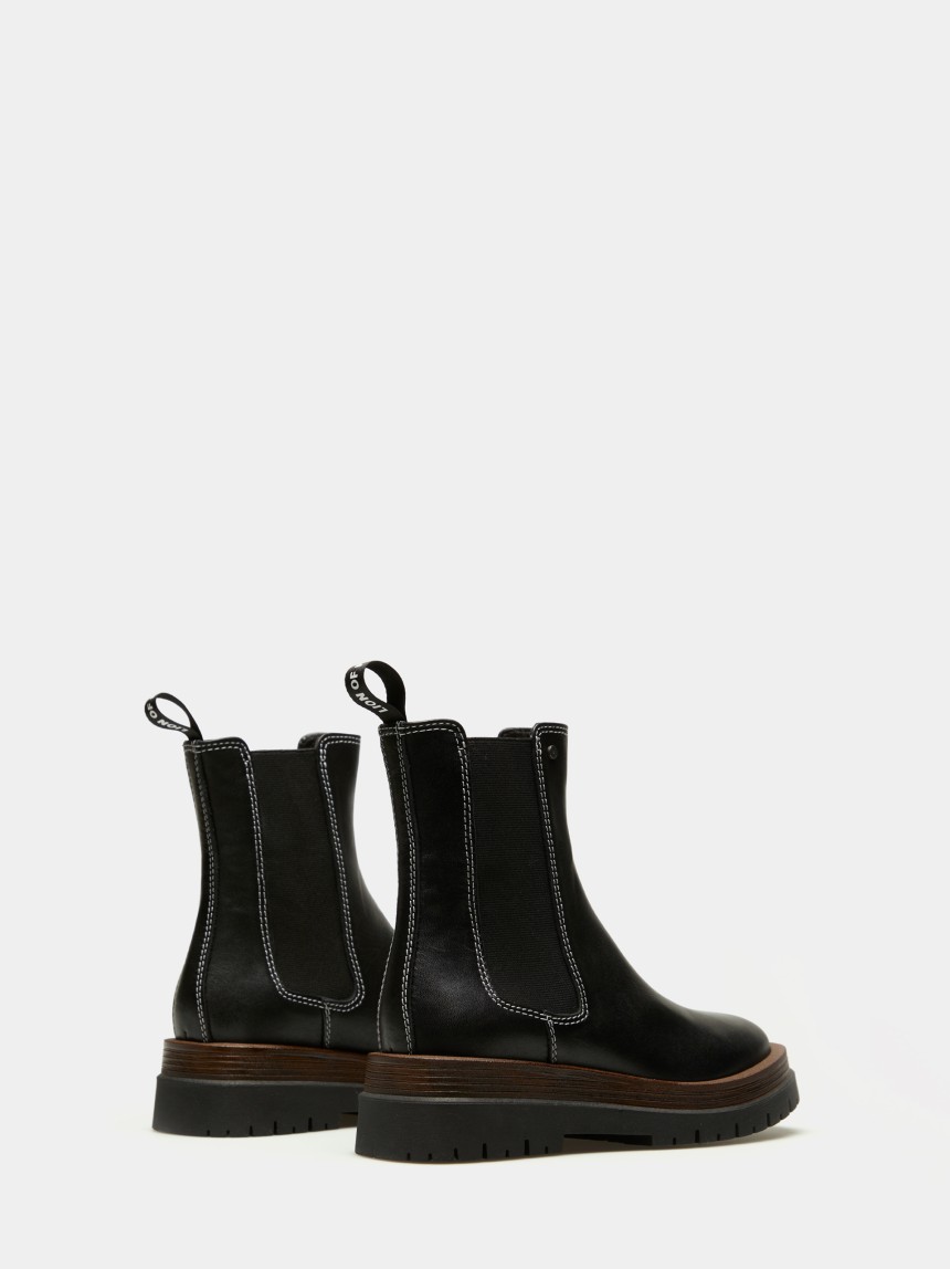 Botins chelsea em pele