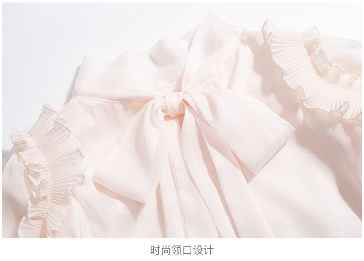 Daybreak - Blouse met pofmouwen en hoge hals, effen en ruches