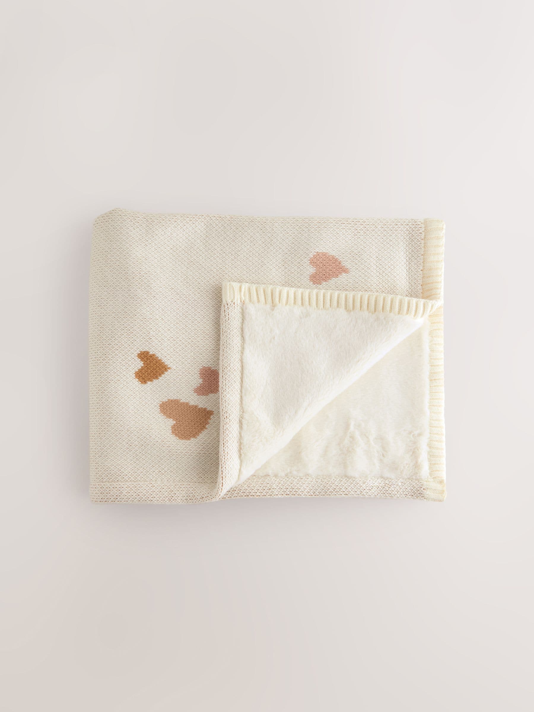 Gebreide babydeken met fleece voering